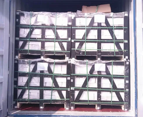 Container filled with premium stacked stone panels for construction projects.