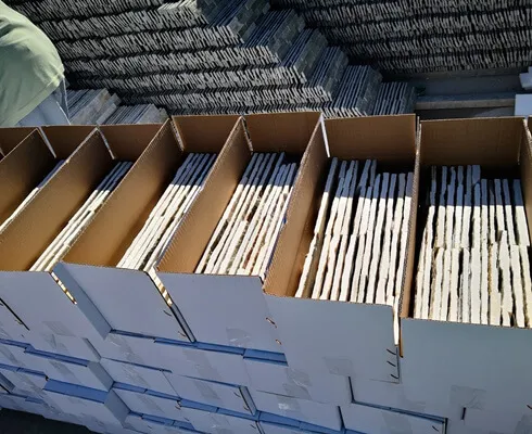 Boxes filled with stacked stone ready for shipping