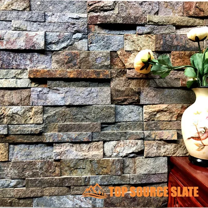 A rustic stacked stone fireplace made with cultured stones.