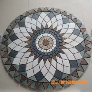 A detailed view of an elegant slate medallion with intricate patterns