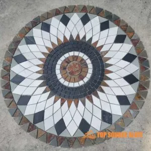 Close-up of an elegant slate medallion showcasing intricate patterns