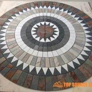 A beautiful slate medallion featuring intricate patterns and textures.