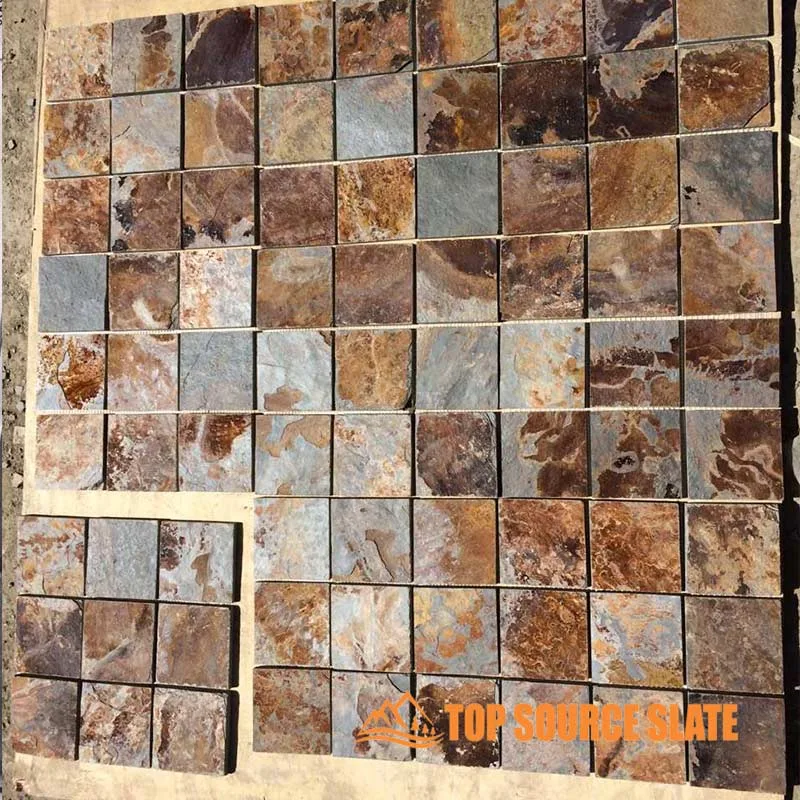 Square stone floor tiles arranged for a stylish driveway paving