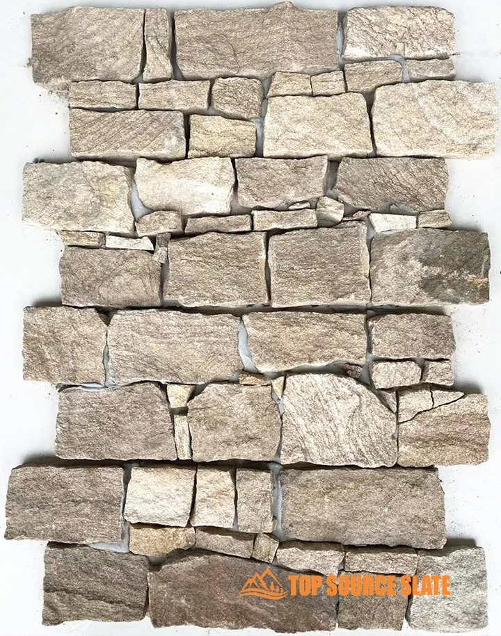 Dry ledgestone wall cladding featuring textured stone panels