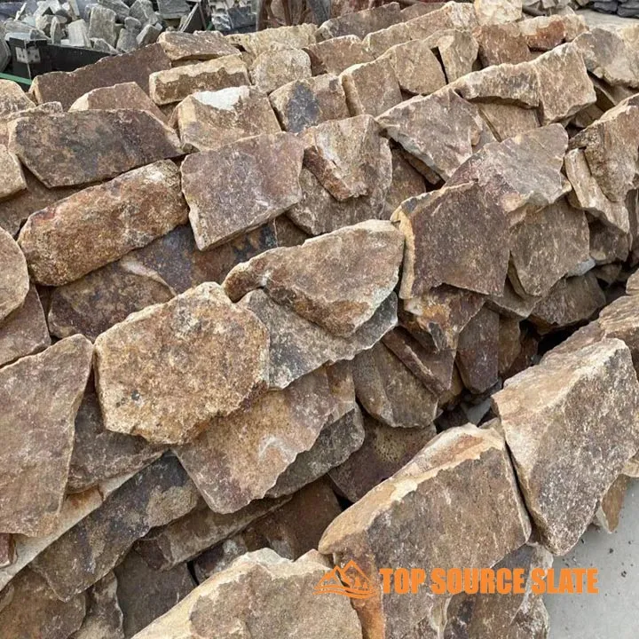 Corner of a dry stack stone wall showcasing textured stones
