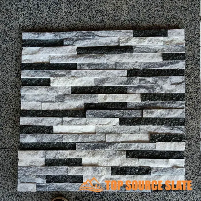Gray stacked stone cladding for exterior walls showcasing texture and color variation