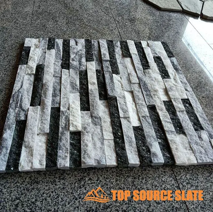 Exterior view of gray stacked stone wall cladding for home