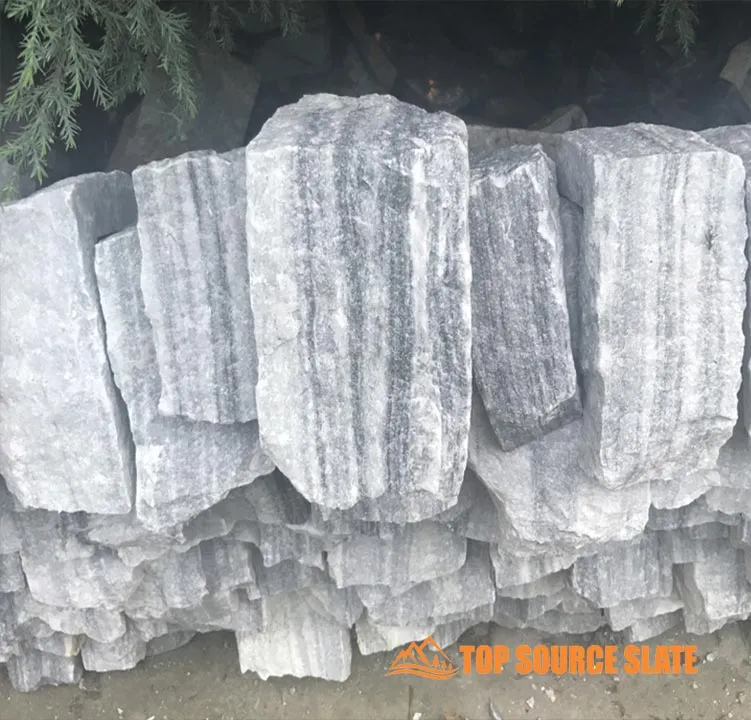 Loose stone cladding with earthy tones for exterior design