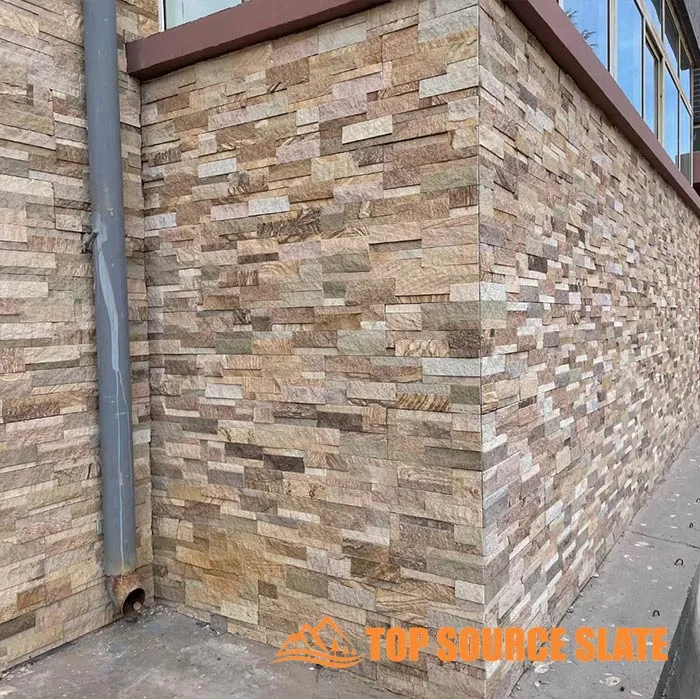 Stylish stacked stone tile fireplace with a warm glow