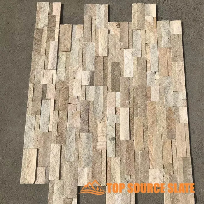 A beautifully designed stacked stone tile fireplace featuring warm tones.