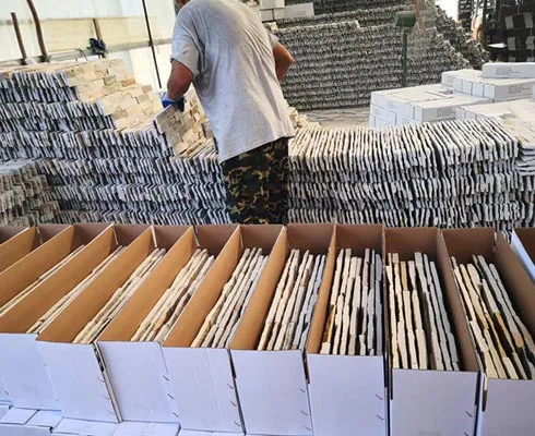 Professional packaging of stacked stone panels for delivery