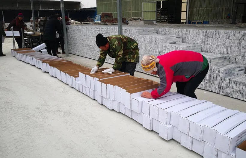Well-organized stacked stone tiles packaging ready for delivery
