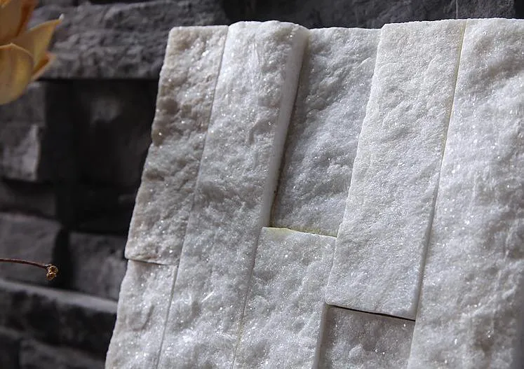 Skilled worker repairing stacked stone wall panels with precision.