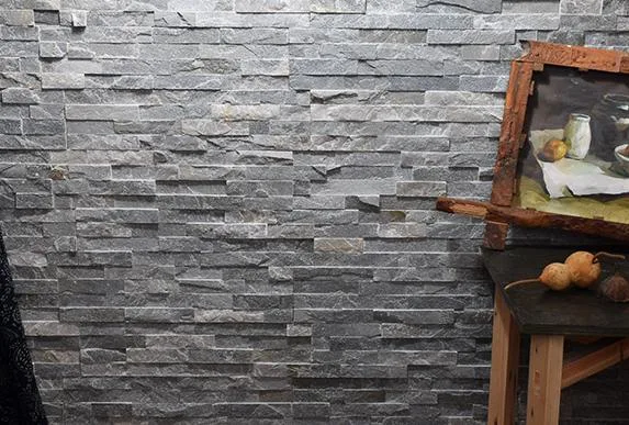 A close-up view of modern stacked stone panels featuring a mix of textures and colors.