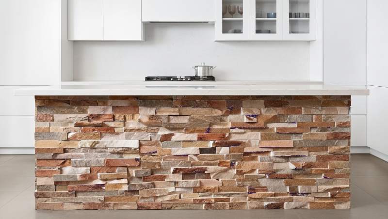 rugged meets refined pairing stacked stone with modern cabinetry (3)